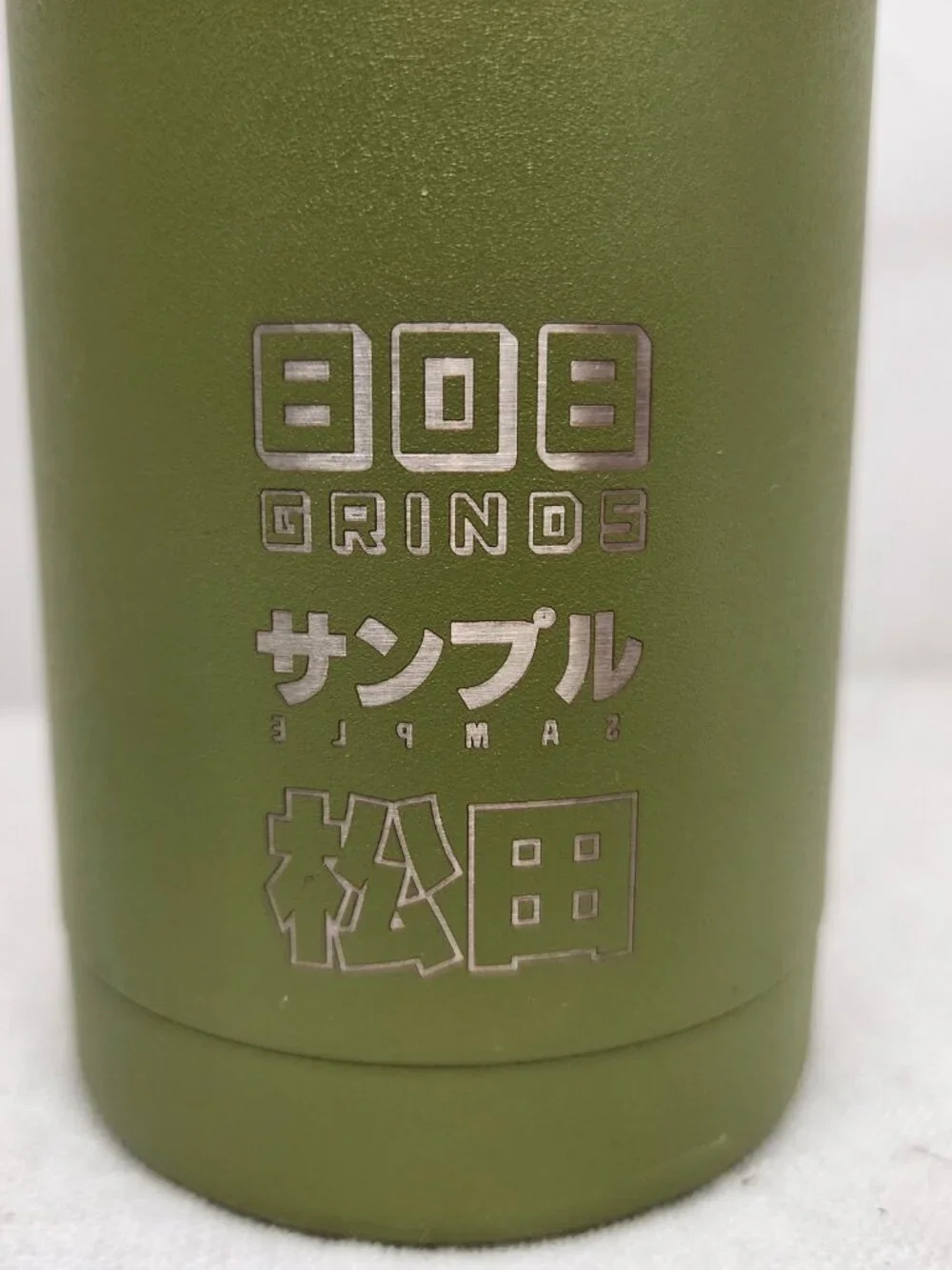 Earthwell Woodie Maui No Ka Oi 808 Grinds  22oz Woodie vacuum insulated bottle